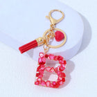 Charm para Bolsos Llavero Corazón Rojo Letras A-Z con Borlas, Colgante de Bolso Regalo para Mujer