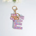 Llaveros Charms Letras A-Z con Colgante Mariposa y Borla - Accesorio Premium para Bolsos