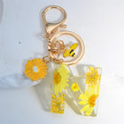 Llavero para moteros con inicial personalizada - Girasol amarillo fashion premium