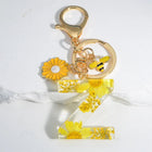Llavero para moteros con inicial personalizada - Girasol amarillo fashion premium
