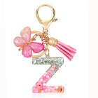 Bag Charm Personalizado: Llavero Letra Inicial Rosa con Colgante Mariposa - Accesorio Premium para B