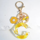 Llavero para moteros con inicial personalizada - Girasol amarillo fashion premium