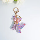 Llaveros Charms Letras A-Z con Colgante Mariposa y Borla - Accesorio Premium para Bolsos