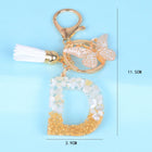 Llaveros Originales para Coche - Elegancia Blanca con Iniciales y Borla de Mariposa