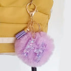 Llavero con Peluche de Letra Inicial y Pompón Morado - Glitter Resina