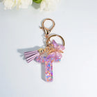 Llaveros Charms Letras A-Z con Colgante Mariposa y Borla - Accesorio Premium para Bolsos