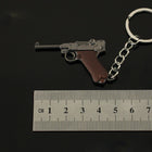 Mini Cámara Llavero Metálico - Colección de Armas Anime Premium para Fiestas y Mochileros