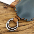 Llavero de Cuero <br> La Protección Suits