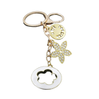 Bag Charm Premium de Trébol de 4 Hojas con Flor de Cristal - Llavero Elegante para Bolso
