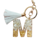 Llaveros Charms Personalizados con Iniciales - Letras Doradas y Borla Blanca para Bolsos