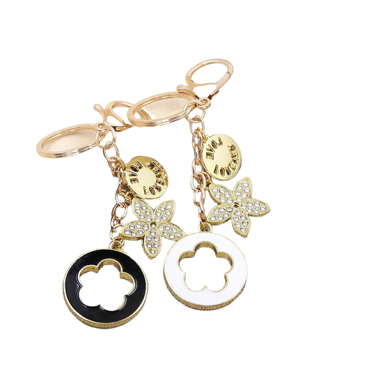 Bag Charm Premium de Trébol de 4 Hojas con Flor de Cristal - Llavero Elegante para Bolso